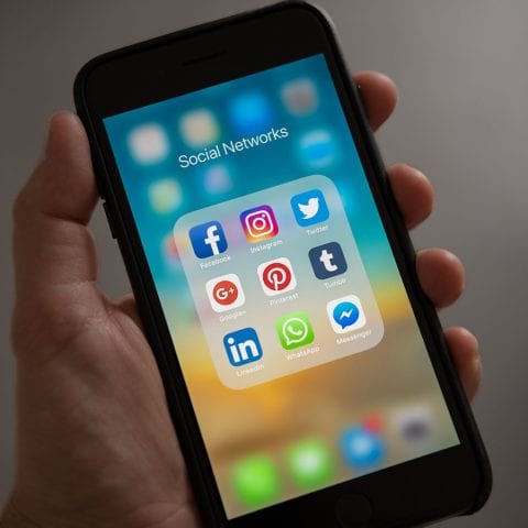 An Iphone menu, showing icons for all major social networks