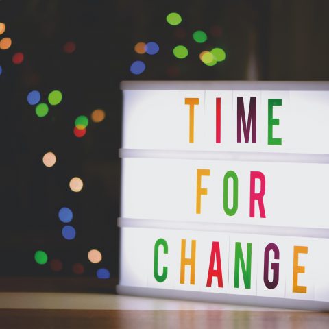 A screen saying time for change