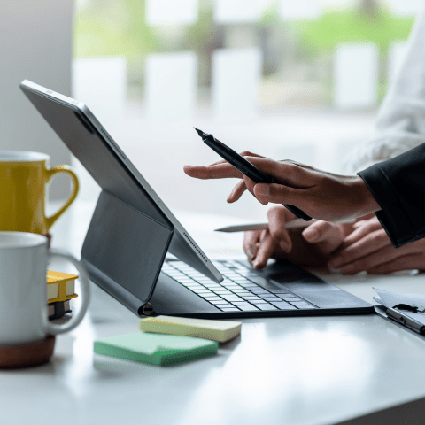 people checking and discussion with tablet